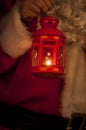 Christmas Lantern with Santa Claus in the Background Royalty Free Stock Photo