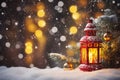 Christmas lantern on the snow with fir branch in the light. Winter decoration background Royalty Free Stock Photo
