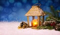 Christmas lantern on white snow. Royalty Free Stock Photo