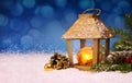 Christmas lantern on white snow. Royalty Free Stock Photo