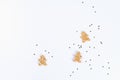 Christmas layout. Golden star shaped confetti and homemade ginger cookies on a white background. New Year 2019, christmas, winter Royalty Free Stock Photo