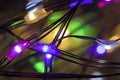 Christmas led multi-colored garland with lights inside drops very close up Royalty Free Stock Photo