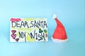 Christmas letter to Santa Claus from kid concept. Closeup of Dear Santa written letter drawing Royalty Free Stock Photo