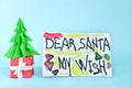 Christmas letter to Santa Claus from kid concept. Closeup of Dear Santa written letter drawing Royalty Free Stock Photo