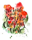 Christmas lettering hand drawn quote on colorful watercolor splash background. Print for card and prints. Royalty Free Stock Photo