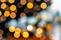 Christmas light background. Holiday glowing backdrop. Defocused background with blurred bokeh Royalty Free Stock Photo