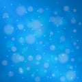 Christmas light blue bokeh effect abstract background. Blurred backdrop with glowing defocused lights. Easy to edit template for