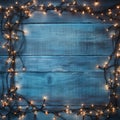 Christmas Light on Blue Wooden Background Top View with Copyspace. Garland Lights on Vintage Wood Royalty Free Stock Photo