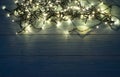 Christmas Light or Garland Lights on Wood Background Royalty Free Stock Photo
