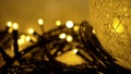 Christmas light close up. Christmas lights and toys, close-up. Christmas tree decorated with golden balls. Christmas Royalty Free Stock Photo