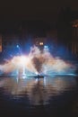 Christmas light show in the form of the Swan Dance on the water canal in the historic district in Bruges, Belgium. Romantic scene Royalty Free Stock Photo