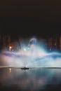 Christmas light show in the form of the Swan Dance on the water canal in the historic district in Bruges, Belgium. Romantic scene