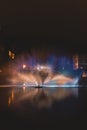 Christmas light show in the form of the Swan Dance on the water canal in the historic district in Bruges, Belgium. Romantic scene