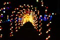 Christmas light tunnel bokeh at night Royalty Free Stock Photo
