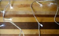 Christmas light on wood background