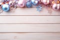 Christmas light wooden background with pink and blue Christmas balls. ai generated