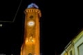 Christmas lights on ancient clock tower Royalty Free Stock Photo