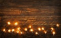 Christmas lights bulb on wood table