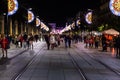 Christmas lights decoration at street of Seville and lots of people walking during the Christmas days Royalty Free Stock Photo