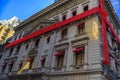 Christmas lights decorations of red ribbon and panther on the Cartier store on Fifth Avenue in Manhattan New York, USA Royalty Free Stock Photo