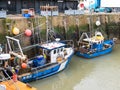 Christmas lights on fishing boats in Whitstable Harbour Royalty Free Stock Photo