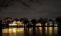 Christmas Lights on houses around Argyle Lake reflecting in the water at night Royalty Free Stock Photo