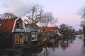 Christmas lights in houses on a river in Dutch town Loenen.