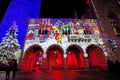 Christmas lights and images of ancient tower and palace