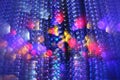 Christmas lights and ornaments. Multicolor bokeh circle background illumination garland decoration. Royalty Free Stock Photo