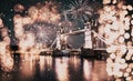 christmas lights and snow in London Tower bridge at night Royalty Free Stock Photo