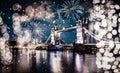 christmas lights and snow in London Tower bridge at night Royalty Free Stock Photo