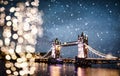 christmas lights and snow in London Tower bridge at night Royalty Free Stock Photo