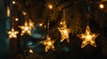 Christmas Lights - Stars String Hanging At Fir Branches Royalty Free Stock Photo