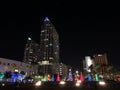 Christmas lights in a town. Christmas trees and palms trees. Southern Christmas celebration Royalty Free Stock Photo