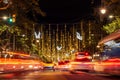 Christmas lights and traffic are seen at night in the city downtown in the Passeig de Gracia main street in Barcelona, Spain on No Royalty Free Stock Photo