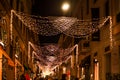 Christmas lights in via Montenapoleone, in the downtown fashion district, in Milan. Christmas vacation in Milan Italy Royalty Free Stock Photo