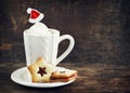 Christmas Linzer Cookies and cup of hot chocolate Royalty Free Stock Photo