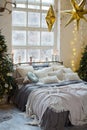 Christmas loft bedroom with decorations and lights