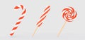 Christmas lollipop in cane shape, spiral and round candies, 3d render. Striped white red caramel on wooden stick Royalty Free Stock Photo