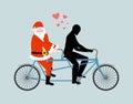 Christmas Lover. Santa Claus on bicycle. Lovers of cycling. Man