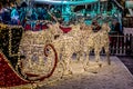 Christmas Magic Reindeer and flickering lights at Christmas fair