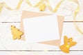 Christmas mail on a white wooden background with a golden angel and christmas tree. Flat lay top view photo mockup