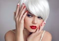 Christmas makeup. Red lips Makeup. Beautiful blonde girl closeup