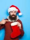 Christmas man with decorative stocking Royalty Free Stock Photo