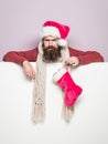 Christmas man with decorative stocking Royalty Free Stock Photo