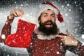 Christmas man with decorative stocking Royalty Free Stock Photo