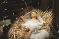 Christmas Manger scene with figures including Jesus. Royalty Free Stock Photo