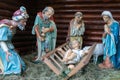 Christmas Manger scene with figures including Jesus, Mary, Joseph, sheep and magi Royalty Free Stock Photo