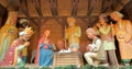 Christmas Manger scene with figurines including Jesus, Mary, Joseph, sheep and magi. Royalty Free Stock Photo