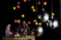 Christmas Manger scene with Jesus, Mary and Joseph with unfocused lights Royalty Free Stock Photo